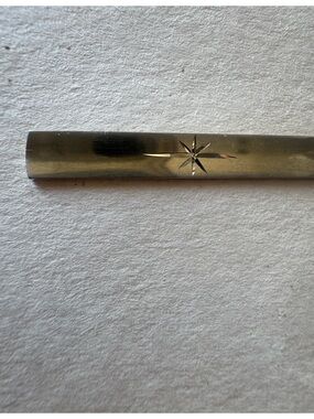 UNAVAILABLE Tie clip with starburst design gold tone
